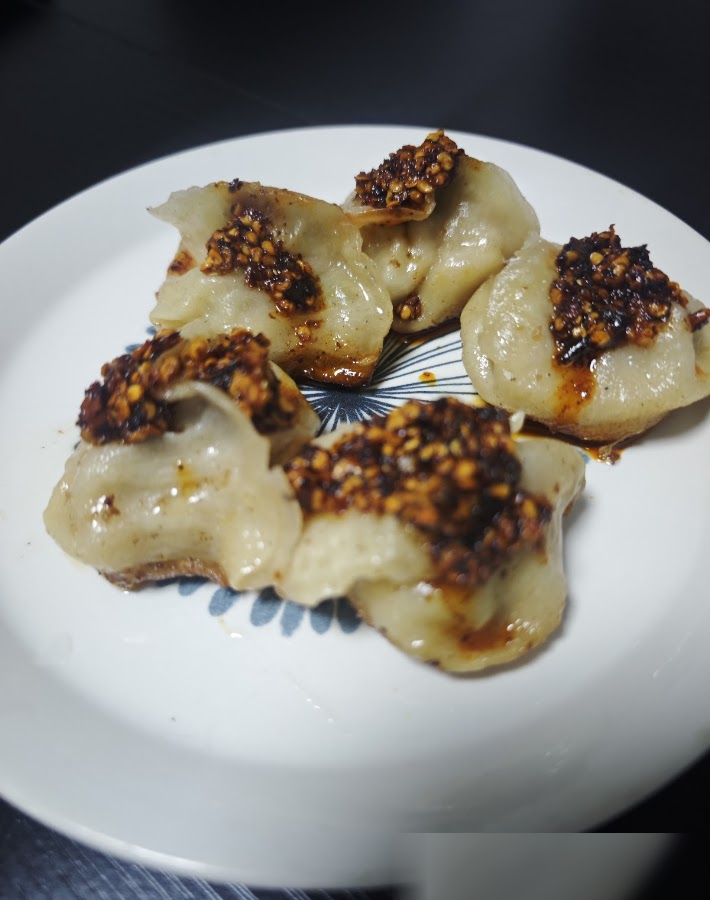 Homemade dumplings with chili crisp