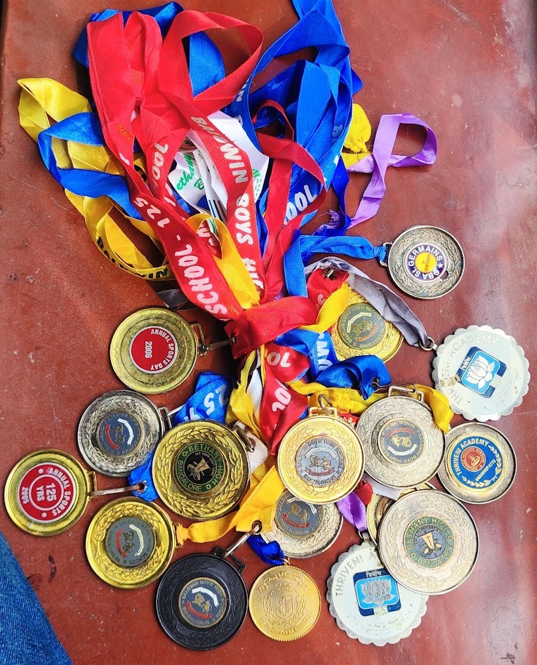 Collection of school sports medals from Baldwin Boys High School