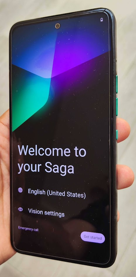 Solana Saga phone welcome screen held in hand